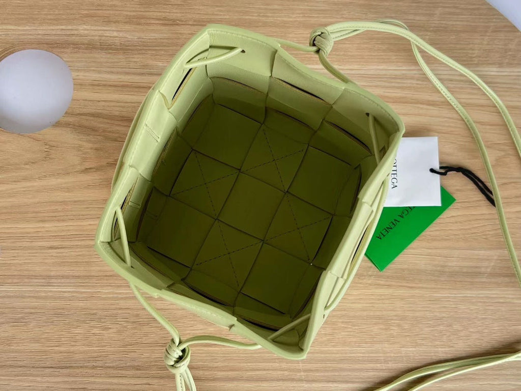 BOTTEGA VENETA SMALL CASSETTE BUCKET 18 IN PASTEL YELLOW CALFSKIN