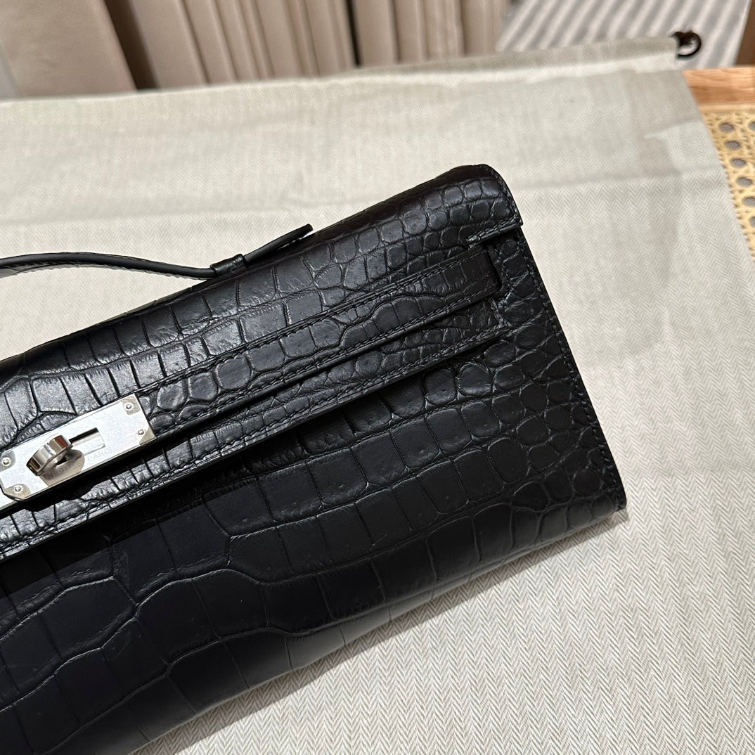 HERMES KELLY CUT 31 IN BLACK SHINY ALLIGATOR LEATHER WITH SILVER HARDWARE
