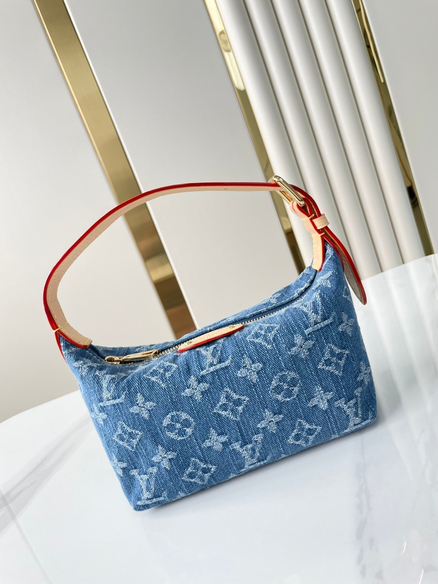 LOUIS VUITTON HILLS POCHETTE 18 IN BLUE MONOGRAM DENIM