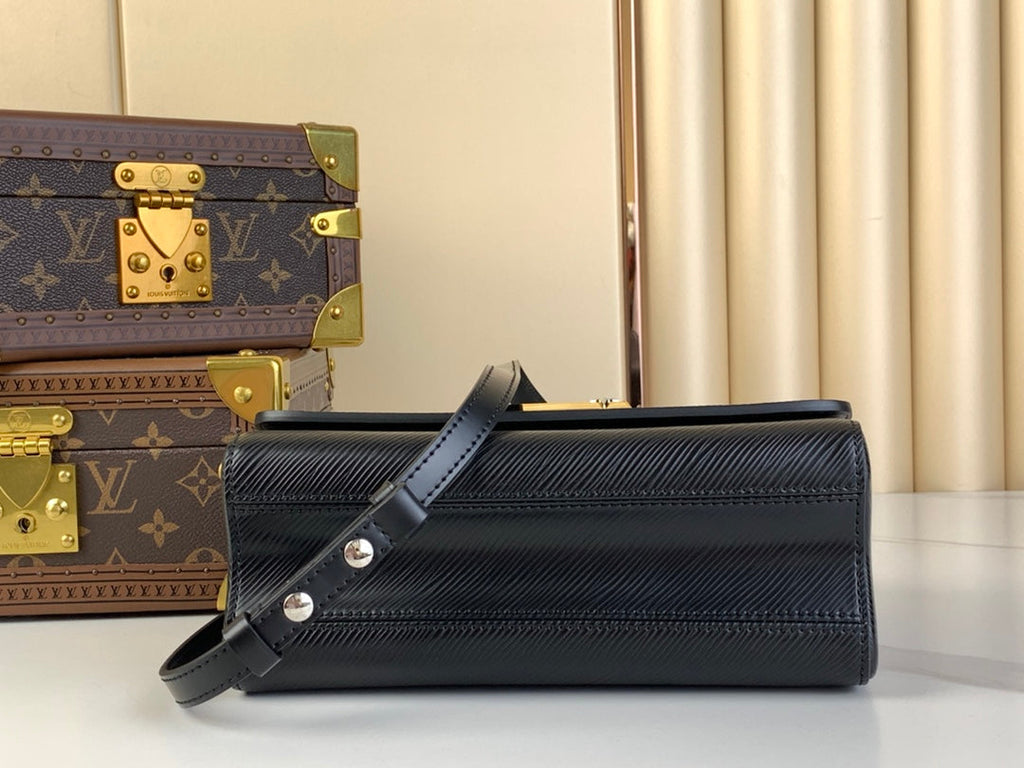 LOUIS VUITTON TWIST MM 23 IN BLACK EPI LEATHER GOLD AND SILVER HARDWARE