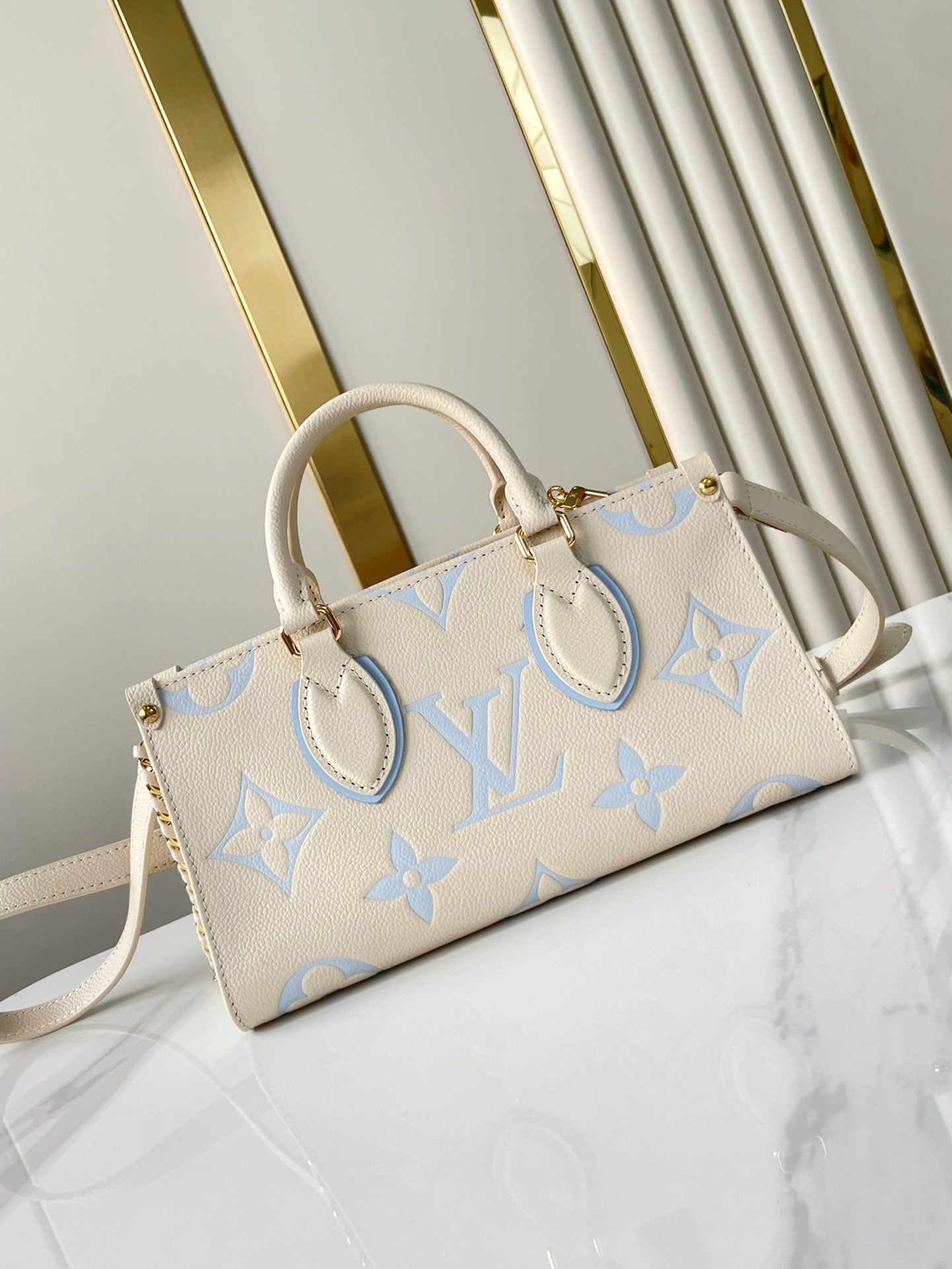 LOUIS VUITTON ONTHEGO 25 IN CREAM BLUE CALFSKIN GOLD HARDWARE