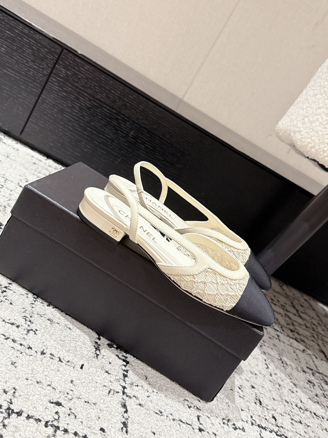 CHANEL SLINGBACK 25S IN OFF WHITE AND BLACK FABRIC