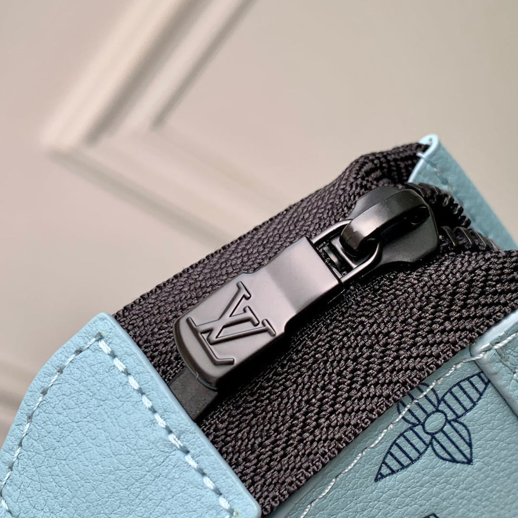 LOUIS VUITTON GASTON WEARABLE WALLET 22 IN SKY BLUE MONOGRAM SHADOW CALFSKIN EMBOSSED LOGO