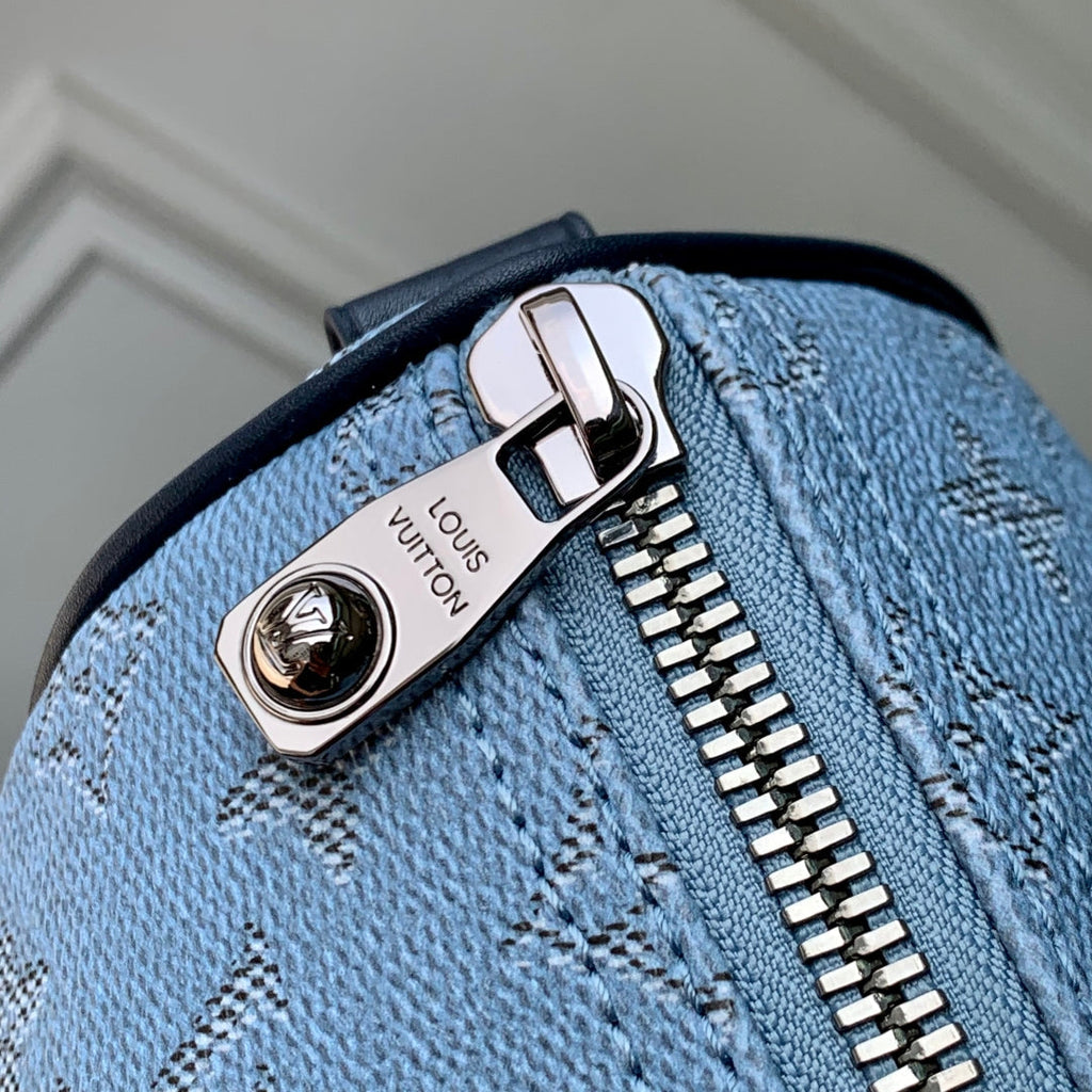 LOUIS VUITTON KEEPALL BANDOULIÈRE 25 INSKY BLUE MONOGRAM HERITAGE CANVAS DARK BLUE CALFSKIN