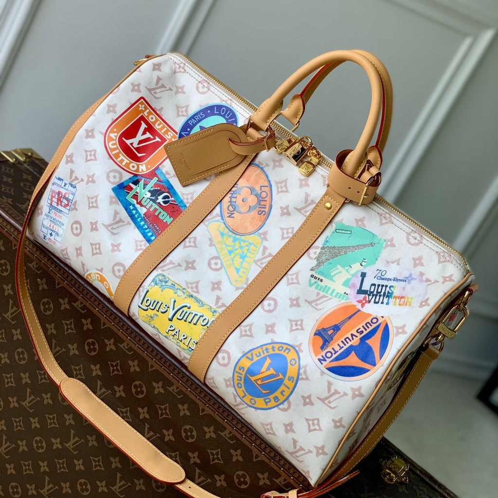 LOUIS VUITTON KEEPALL BANDOULIÈRE 45 IN WHITE MONOGRAM DUNE CANVAS AND CALFSKIN