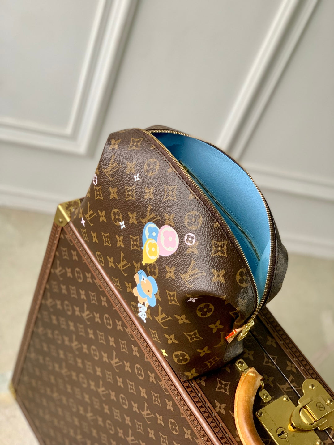 LOUIS VUITTON VIVIENNE 27 IN BROWN MONOGRAM COATED CANVAS GOLD LOCK