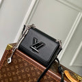 LOUIS VUITTON TWIST SLIM 19 IN BLACK TAURILLON CALFSKIN WITH PEARL CHAIN