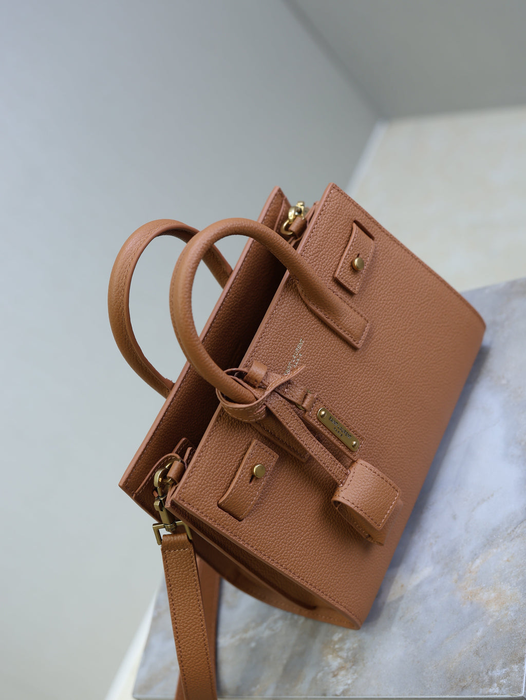 YSL 25S SAC DE JOUR MM 26 IN CHESTNUT BROWN SUPPLE GRAINED CALFSKIN