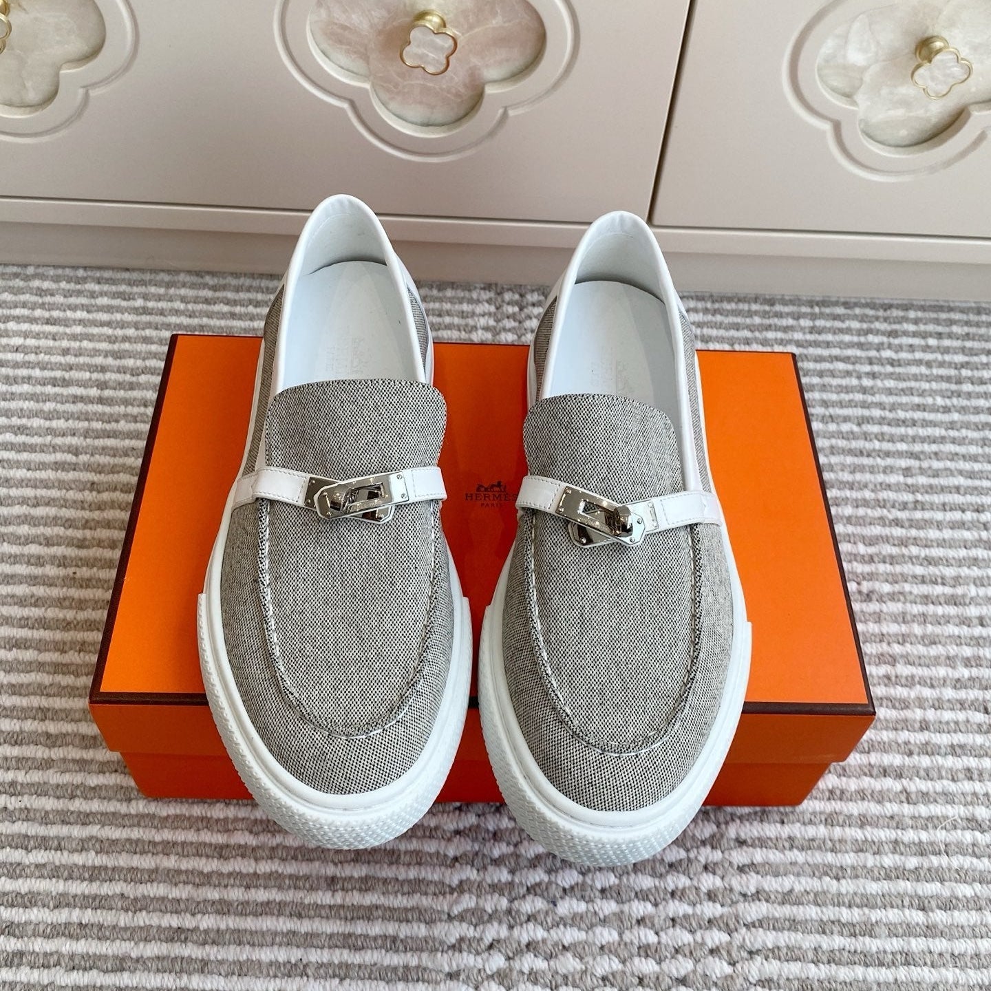 HERMES 25S SLIP-ON IN LIGHT GREY CANVAS WITH SILVER HARDWARE