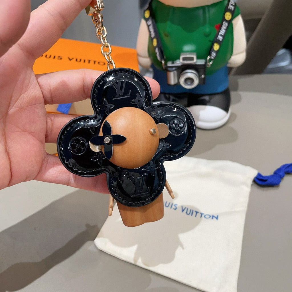 LOUIS VUITTON LV KEYCHAIN IN BLACK CALFSKIN AND WOOD