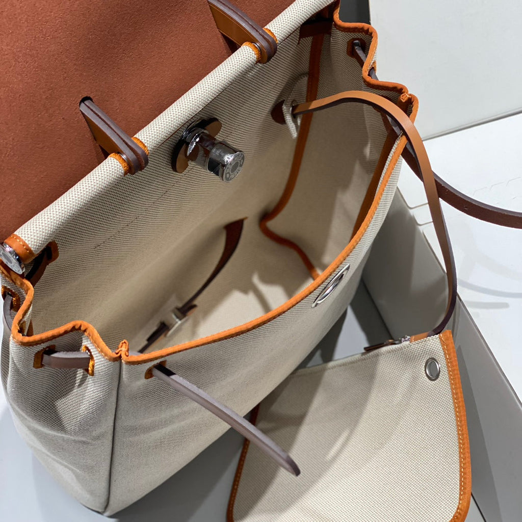 HERMES HERBAG A DOS ZIP RETOURNE BACKPACK 29 IN OFF-WHITE CANVAS AND BROWN CALFSKIN