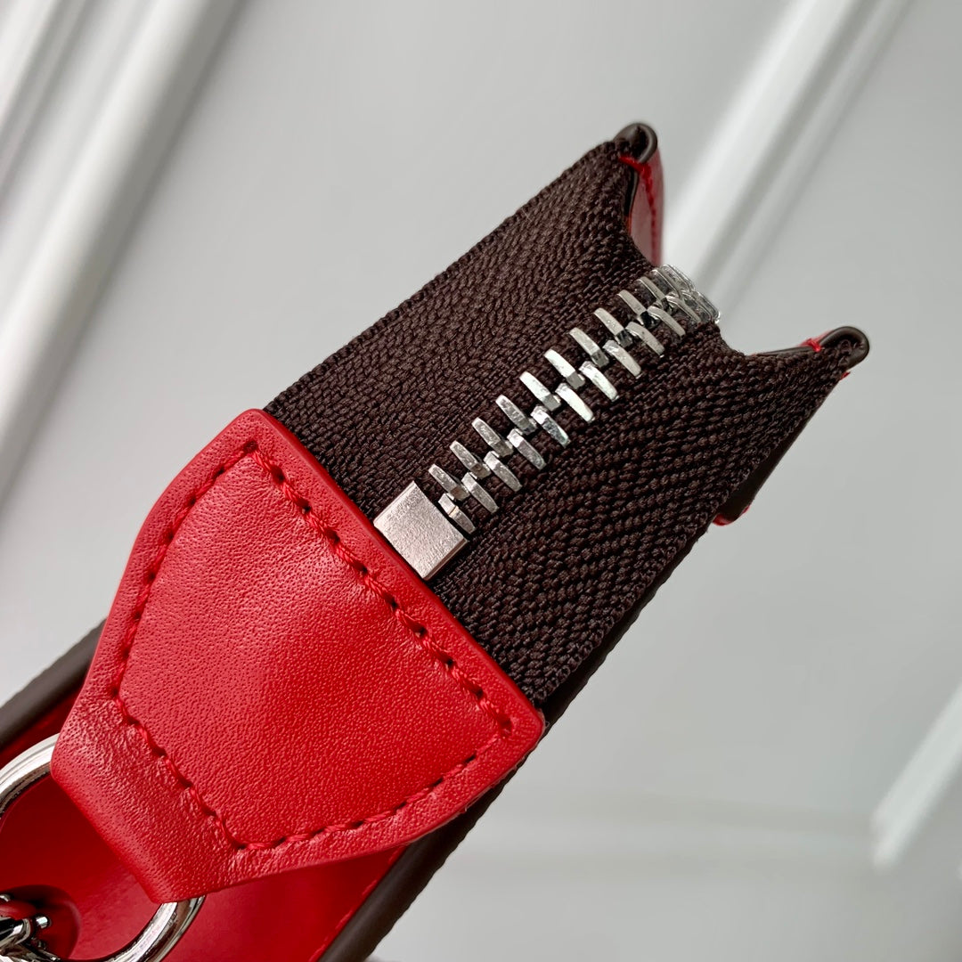LOUIS VUITTON GASTON WEARABLE WALLET 18 IN BROWN MONOGRAM CANVAS MIX RED CALFSKIN