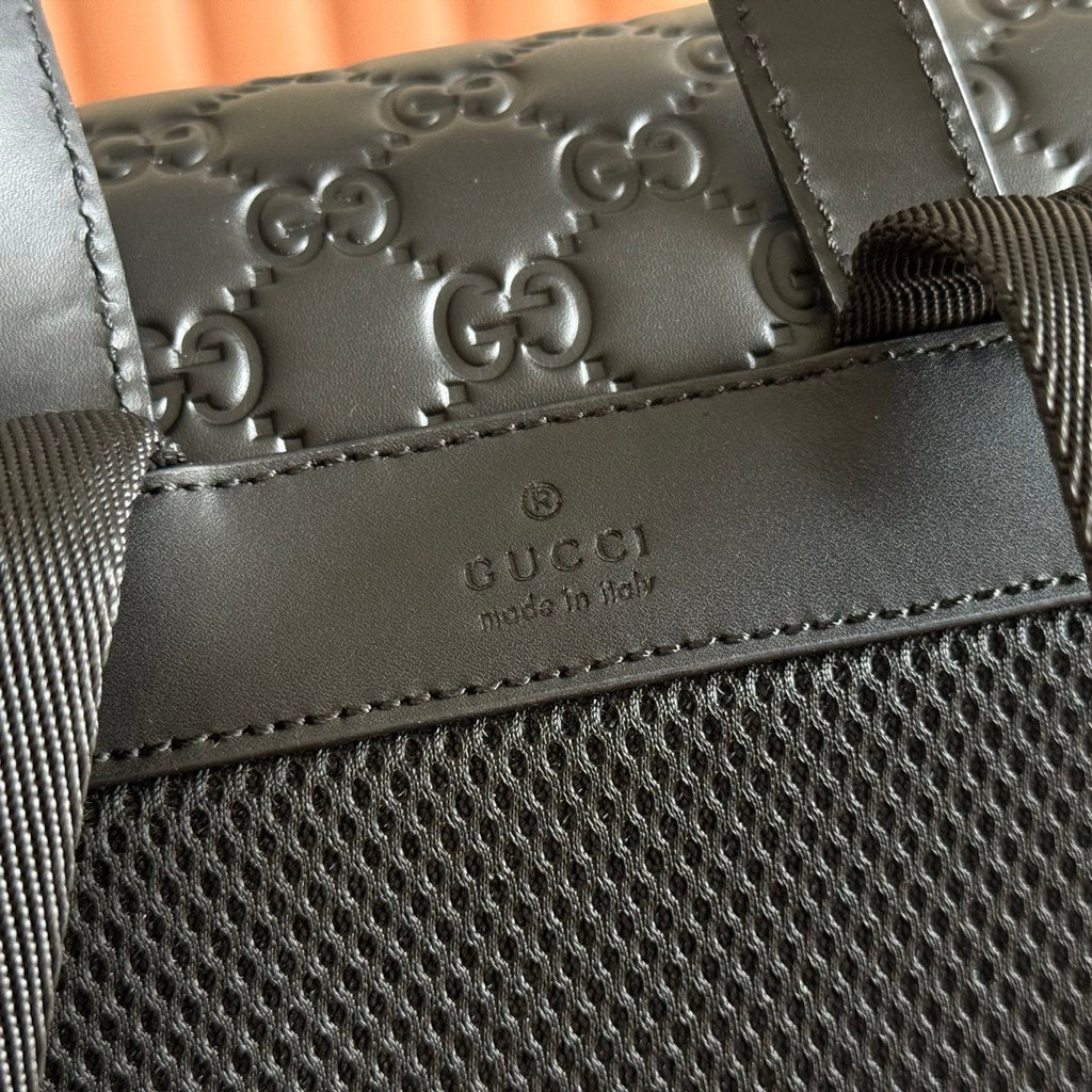 GUCCI 26S  EMBLEM BACKPACK 44 IN BLACK EMBOSSED CALFSKIN