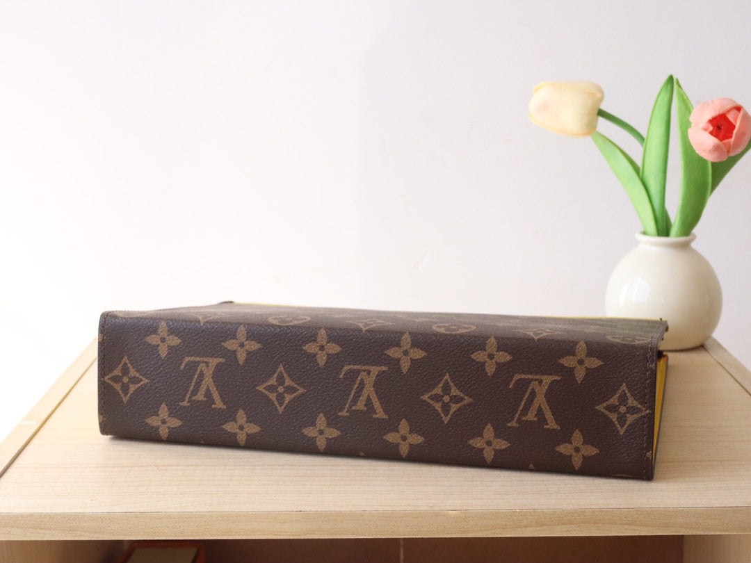 LOUIS VUITTON LV 25S POCHETTE VOYAGE 26 IN YELLOW MONOGRAM MACASSAR COATED CANVAS