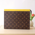 LOUIS VUITTON LV 25S POCHETTE VOYAGE 26 IN YELLOW MONOGRAM MACASSAR COATED CANVAS