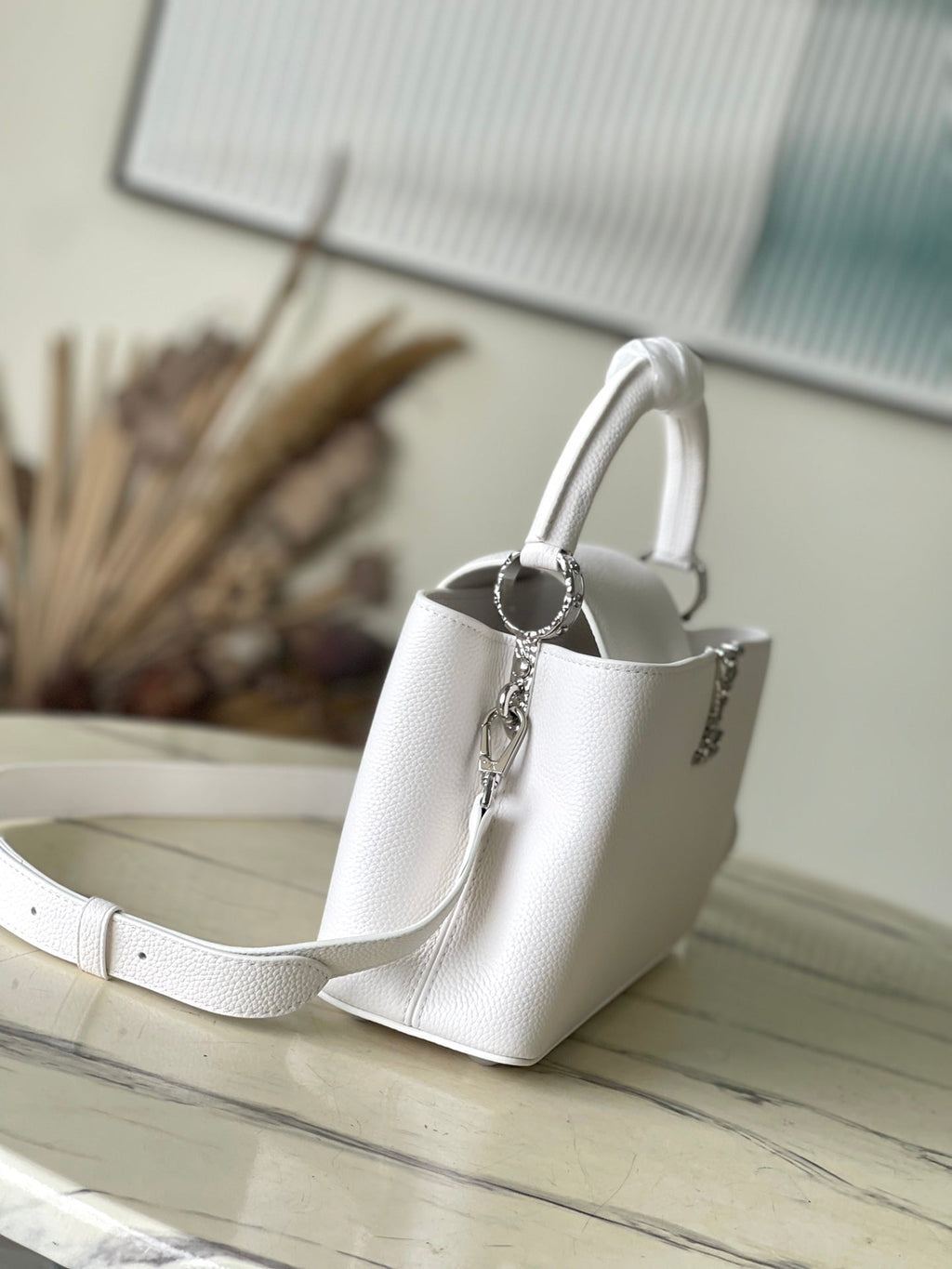 LOUIS VUITTON CAPUCINES EAST-WEST 33 IN WHITE CALFSKIN SILVER HARDWARE