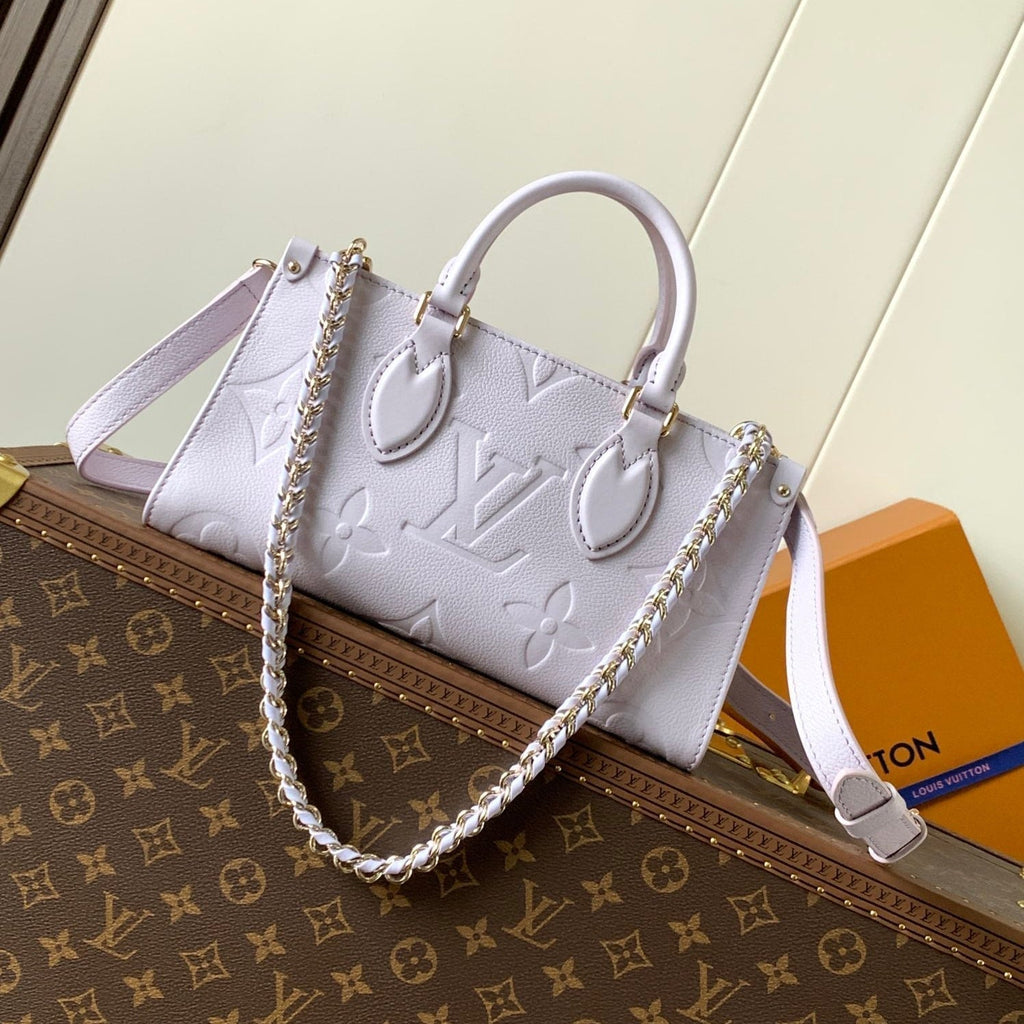 LOUIS VUITTON LV 25S ONTHEGO EAST WEST BAG 25 IN LIGHT LAVENDER CALFSKIN MONOGRAM EMPREINTE