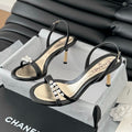 CHANEL PEARL SANDAL IN BLACK AND GOLD LAMBSKIN 75 MM