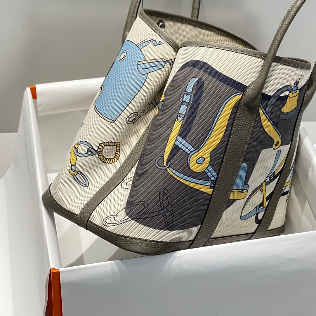 HERMES GARDEN PARTY 36 IN IVORY YELLOW BLUE TOILE H CANVAS ETOUPE CALFSKIN EQUESTRIAN HARNESS PRINT