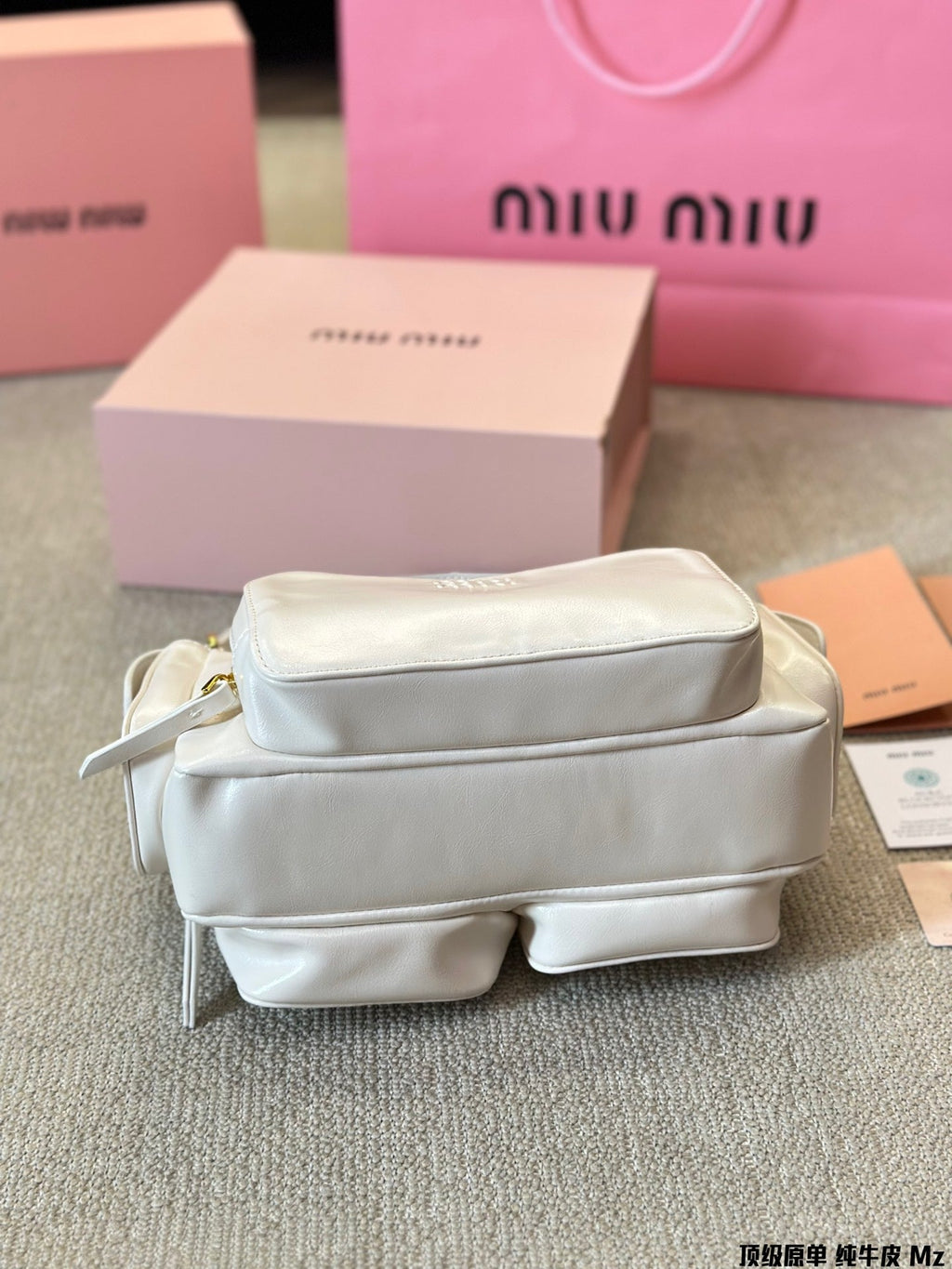 PUCKET BAG IN WHITE CALFSKIN
