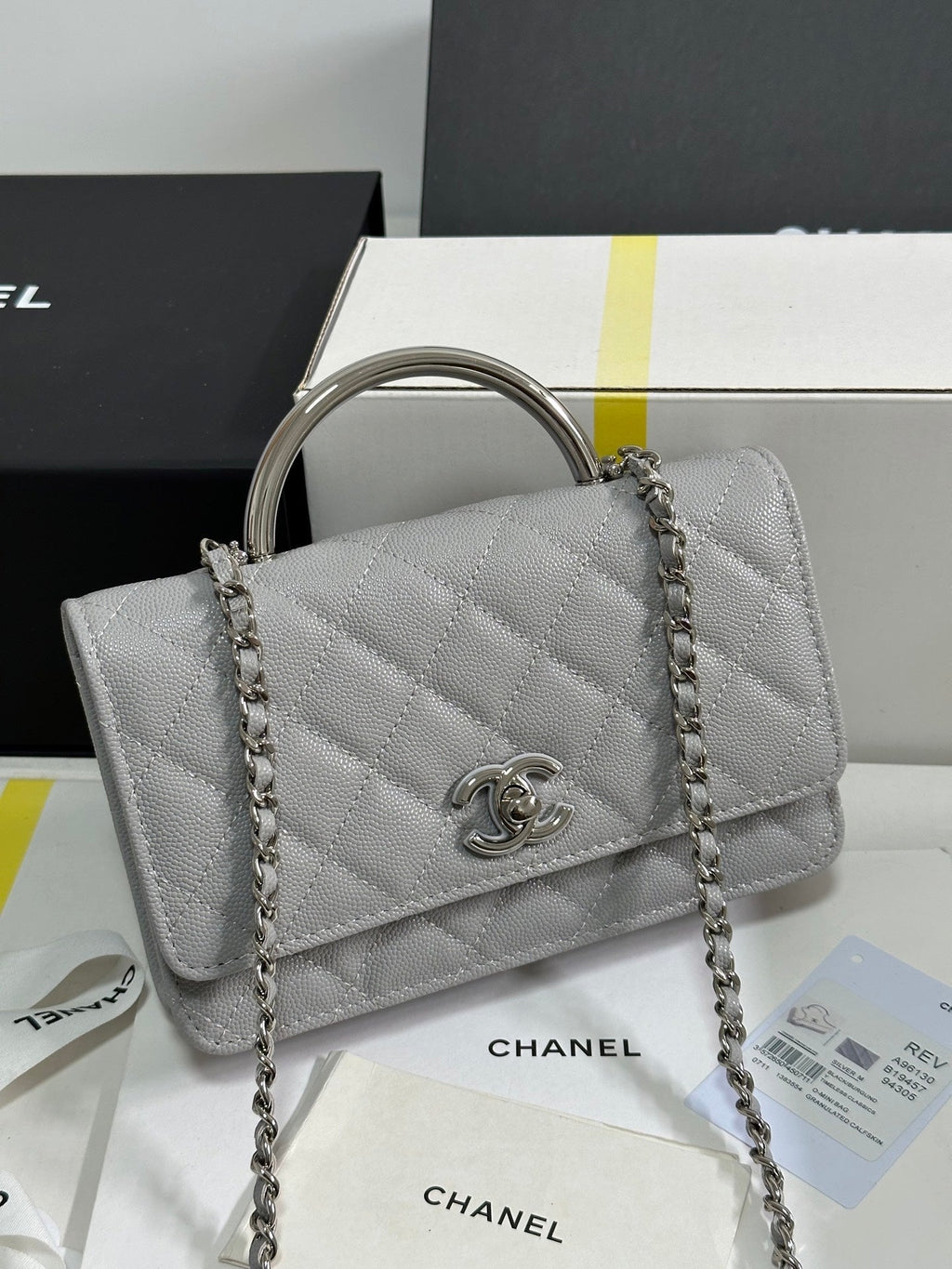 CHANEL FLAP BAG WITH SILVER-TONE HANDLE 19 IN GREY SHINY CAVIAR SKIN