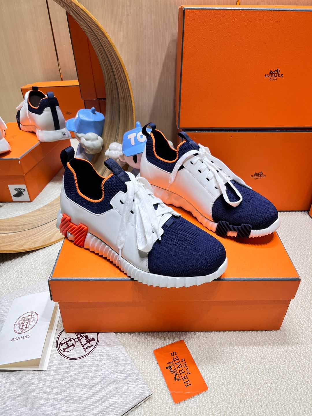 HERMES DEPART SLIP-ON SNEAKER IN NAVY BLUE KNIT AND WHITE CALFSKIN