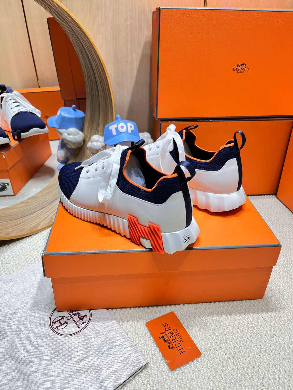 HERMES DEPART SLIP-ON SNEAKER IN NAVY BLUE KNIT AND WHITE CALFSKIN