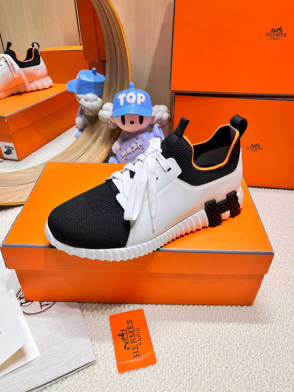 HERMES DEPART SLIP-ON SNEAKER IN WHITE MIX BLACK KNIT AND CALFSKIN