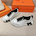 HERMES MAINLAND SNEAKER IN PALE GRAY SUEDE AND WHITE CALFSKIN