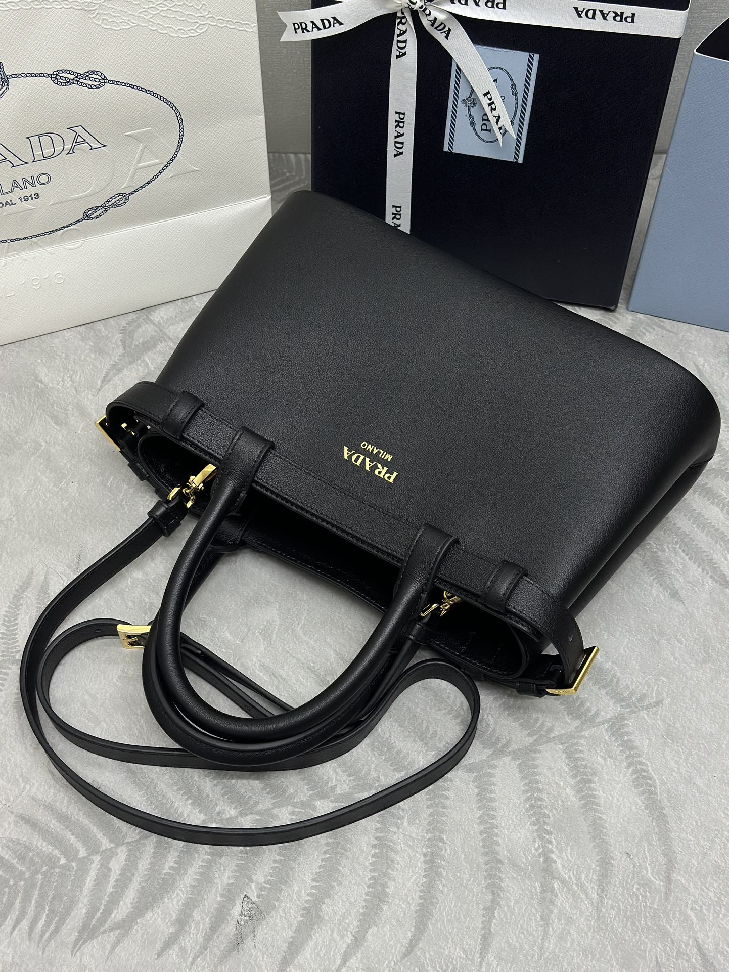 PRADA 25S BUCKLE MEDIUM HANDBAG 28 IN BLACK CALFSKIN GOLD HARDWARE