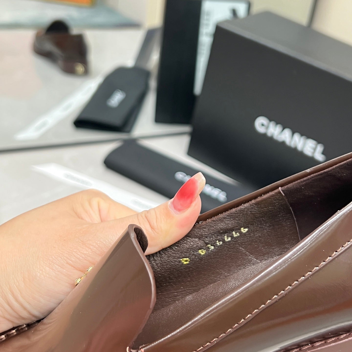 CHANEL MOASINS IN BROWN CALFSKIN