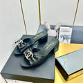 CHANEL BOWKNOT RHINESTONES MID HEEL MULE IN BLACK CALFSKIN