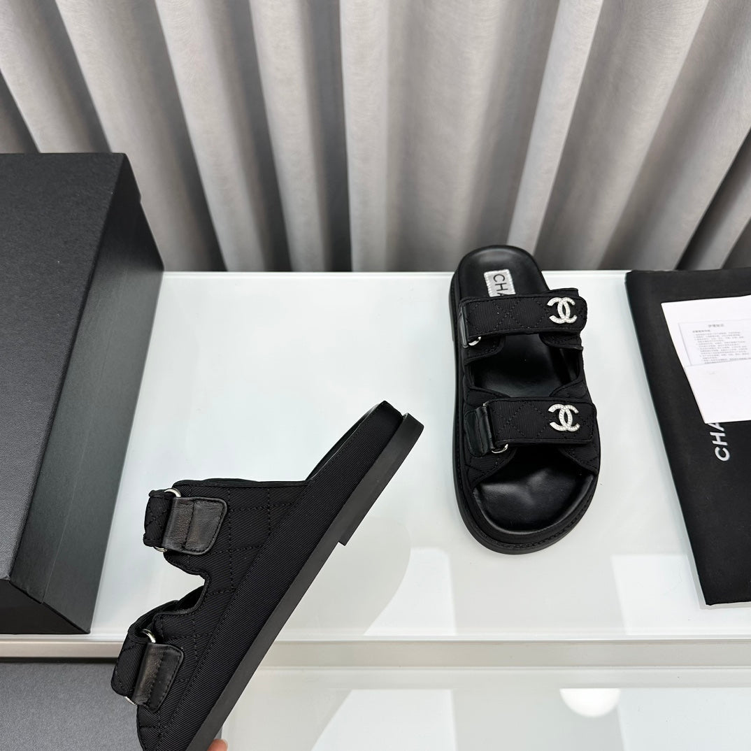CHANEL dad sandals black textile mules