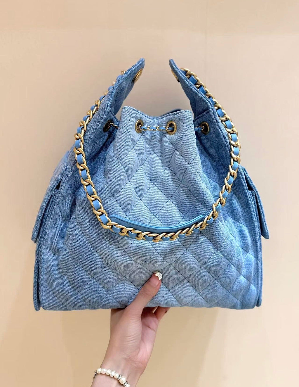 CHANEL 25 HANDBAG 40 IN BLUE DENIM GOLD HARDWARE