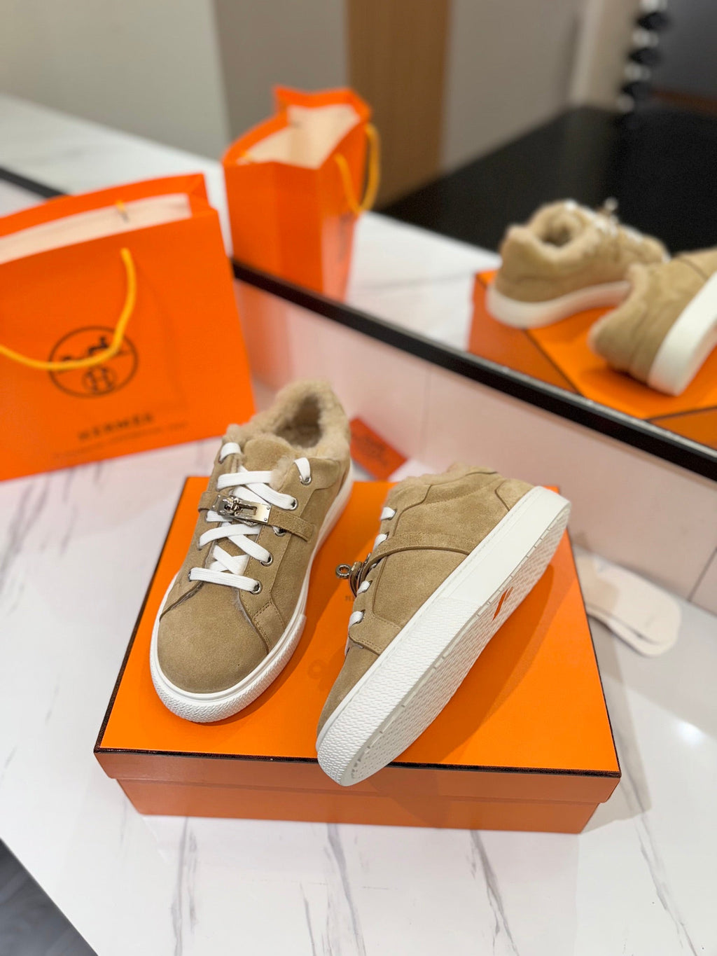 HERMES DAY SNEAKER IN TORTILLA BROWN SUEDE AND FLEECE LINING